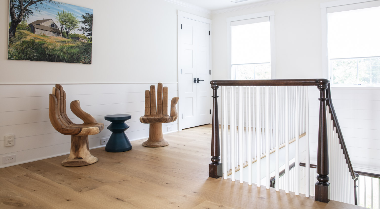 Water Hole blue door welcomes you. Build by Bruce Helier Builders.