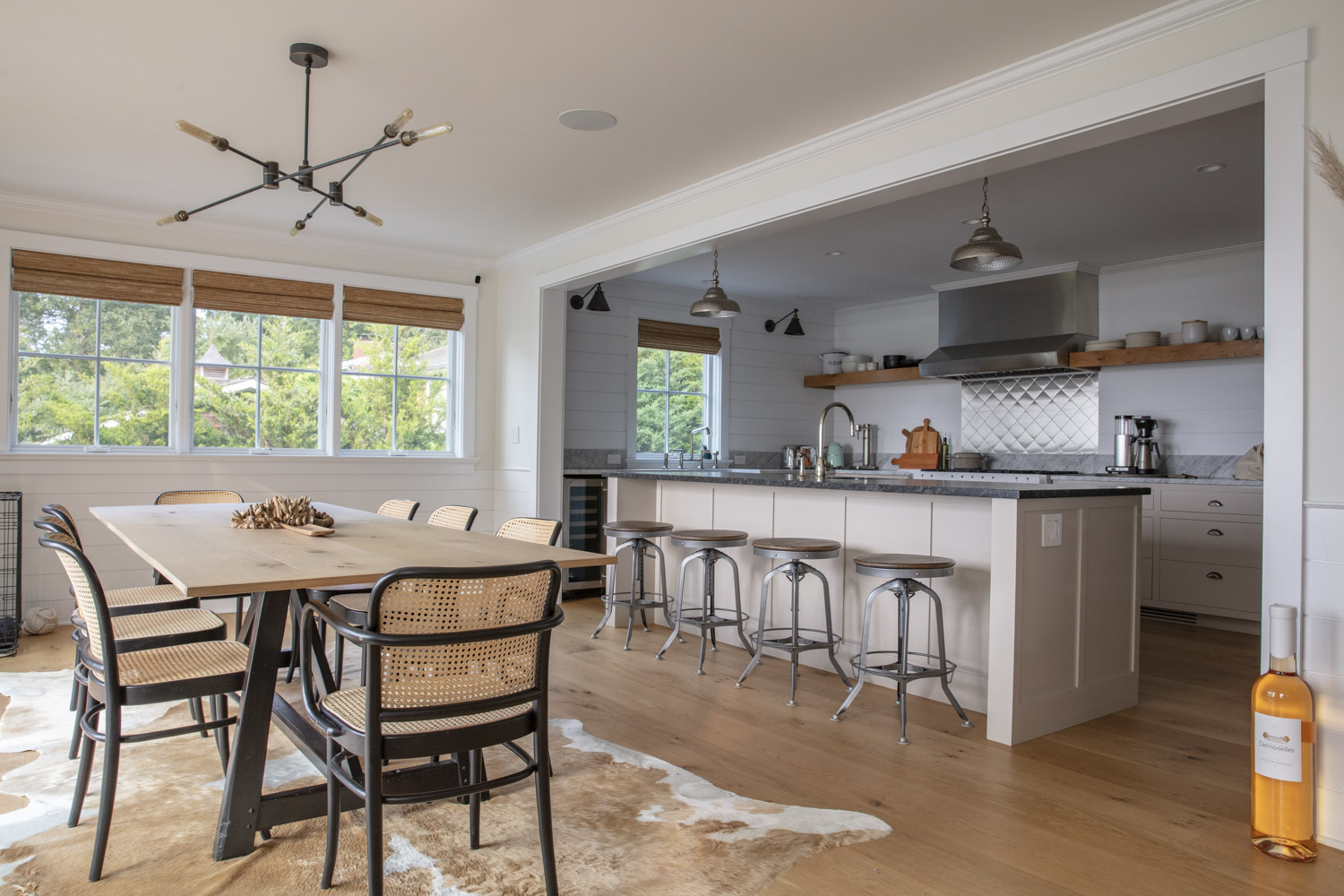 Water Hole blue door welcomes you. Build by Bruce Helier Builders.