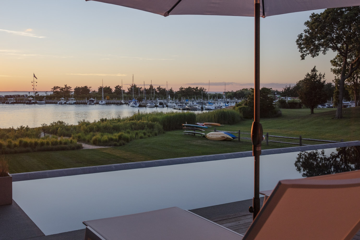 Water Hole blue door welcomes you. Build by Bruce Helier Builders.